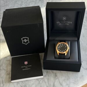 Victorinox Gold and Black Swiss Army Watch with Black Silicone Strap